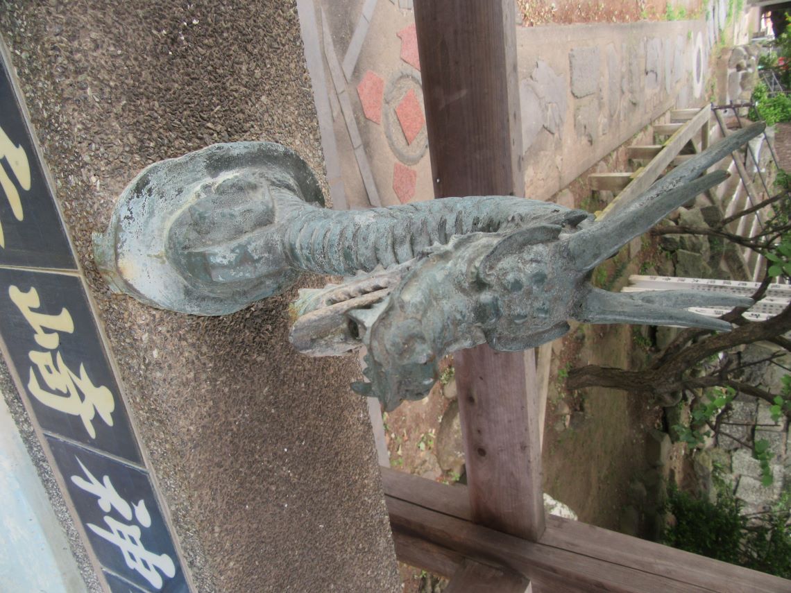 長崎市の梅香崎神社周辺で撮影した、龍の形をした蛇口。
